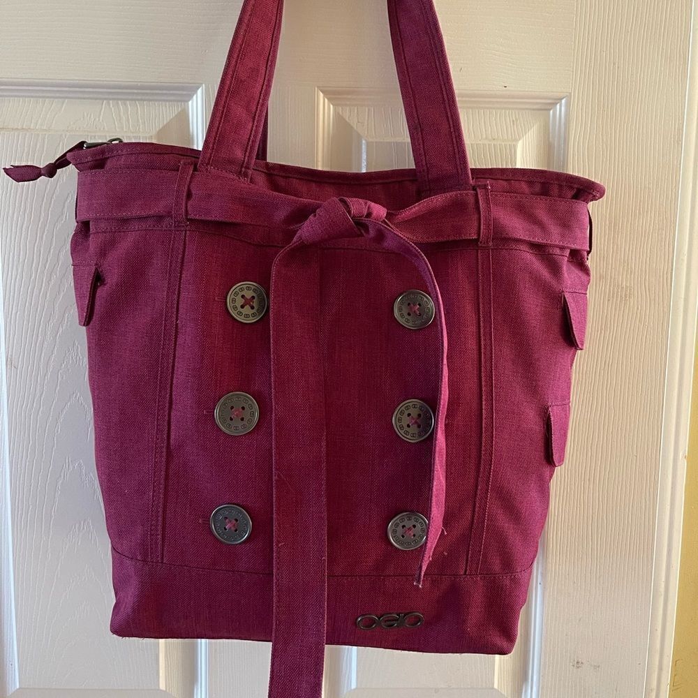OGIO burgundy canvas large laptop tote with decorative belt fully padded